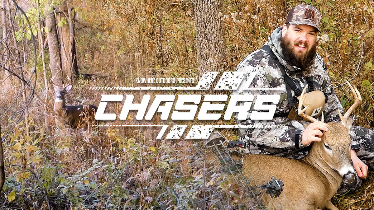 Man in camouflage holding a deer with 'Chasers' logo overlaid.